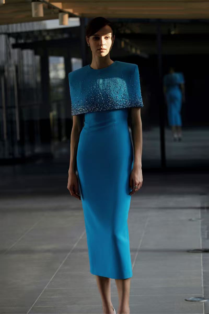 Luxurious,heavy beaded blue long dress with a magnificent shawl cape